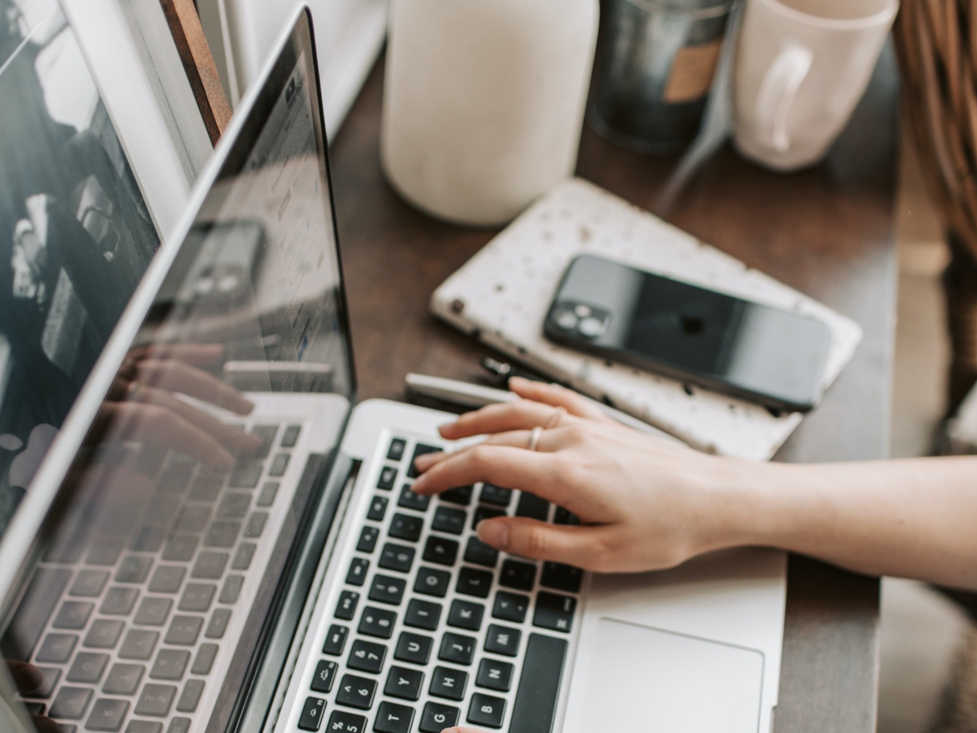 woman typing at computer